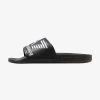 EA7 Emporio Armani VISIBILITY UNISEX - Pantolette Flach - Black -Modeschuhe 28b8b5c38faa412083d36094ce12a1af