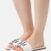 Tory Burch DOUBLE STACK LOGO SLIDE - Pantolette Flach - Gardenia -Modeschuhe 93f94c4e1d9042bfb8f9cd7e7276fc90