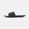 Nike Performance KAWA SLIDE UNISEX - Badesandale - Off Noir/metallic Red Bronze/mint Foam -Modeschuhe d4918fedc8224df8bed7458bd945dc1c